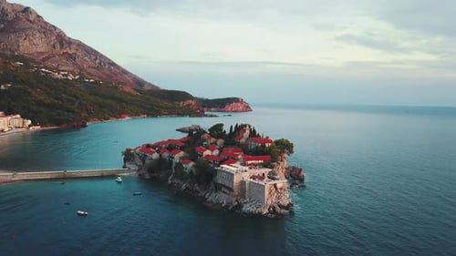 Aerial view of drone flying over island of the Sveti Stefan in Montenegro, Balkans nearby Adriatic