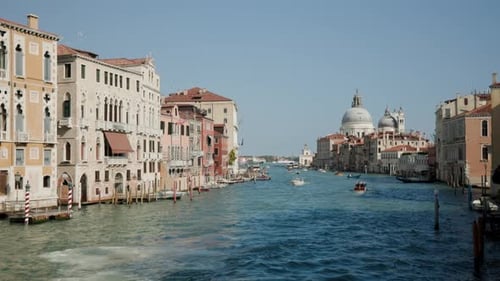 Traffic On The Venetian Grand Canal With Historical Landmarks In Venice, Italy. Slow Motion