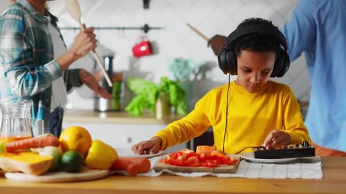 Adorable Small DJ Boy Playing on Child Sound Mixing Machine Making Music Dancing and His Parents