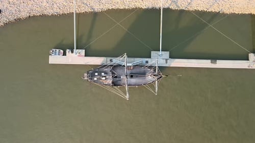 Aerial ascending shot of the Pinta replica, docked on the Cumberland River