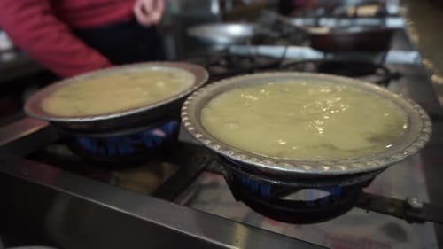 Soups boiling in traditional copper soup bowl, Turkey