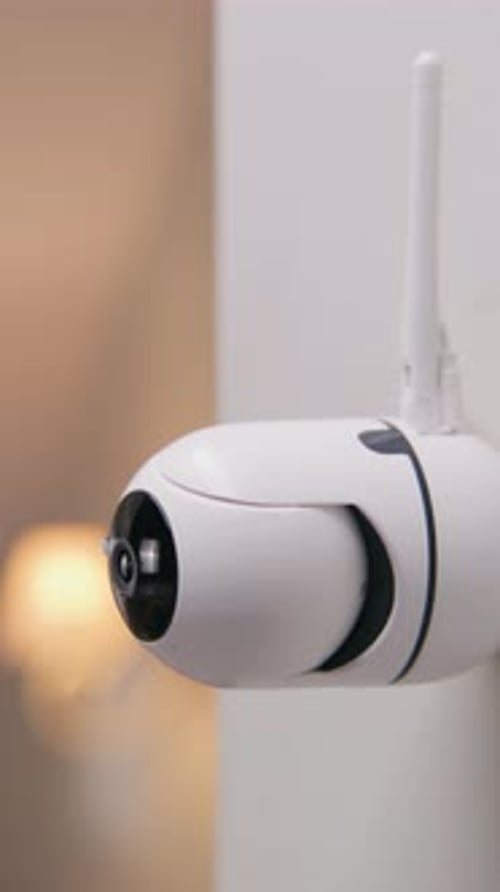 CCTV Camera on Wall in Modern Apartment