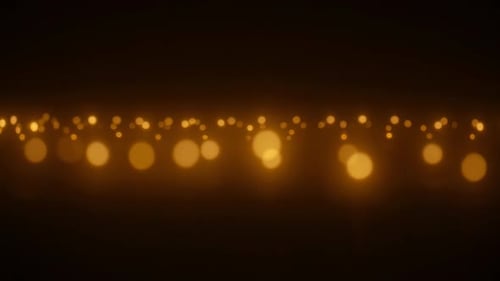 Leuchtende gelbe Bokeh-Lichter