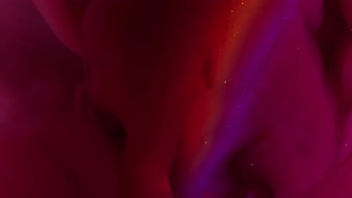 Abstract background with vibrant red, pink and purple colors