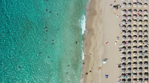 Aerial drone video of Falassarna beach, crystal waters, golden sand, endless sandy turquoise beach o