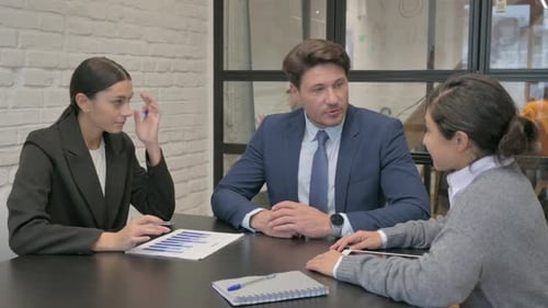 Business Meeting with Team in Modern Office