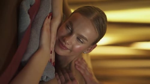 Spa Professional Masseur Makes a Relaxing Back Massage to a Young Woman Using Oils Female Enjoy a