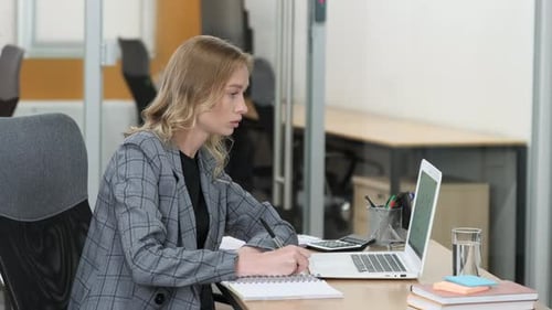 Young Woman Working at Modern Office