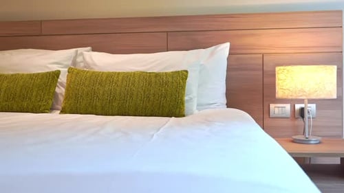 Inviting Queen Bed in Hotel Room