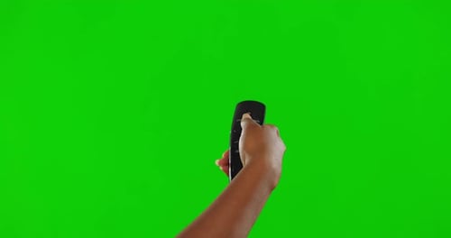 Hand, remote control and green screen, change channel and watching tv with technology