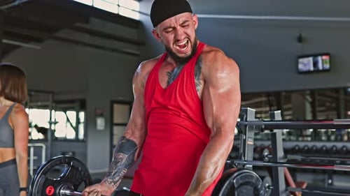 Indoor Gym Session Two Dedicated Individuals Lift Weights