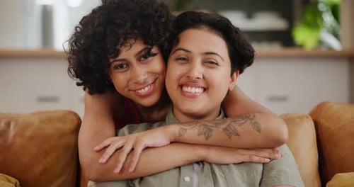 Loving Couple Embrace on Comfortable Couch Indoors