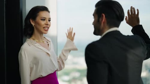 4K Caucasian businessman and businesswoman discussion business project together at office rooftop.