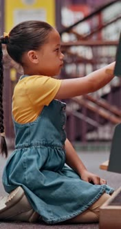 Girl, student and bookshelf with choice for story, novel or selection in school library