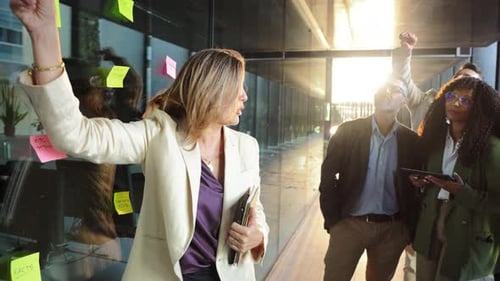 Engaging Business Discussion with Team Members During Brainstorming Session in a Collaborative