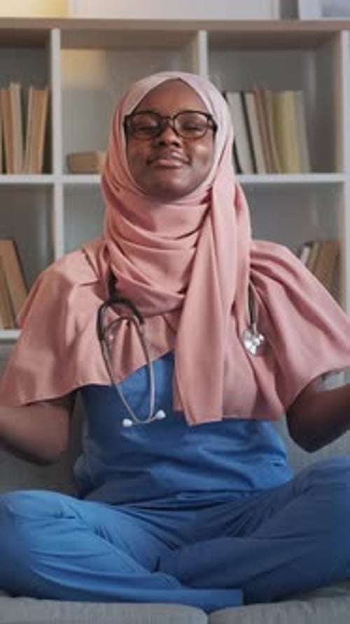 Woman Doctor Meditating to Relieve Stress