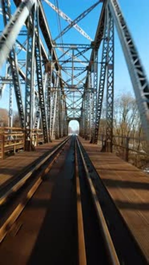 Vertical Video Fast Flight Over the Railway Bridge on FPV Drone