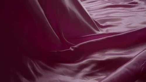 Pink Satin Fabric Flowing in a Gentle Motion