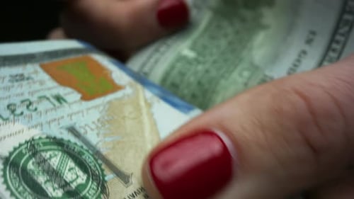 Woman Hands Counting Hundred Dollar Bills