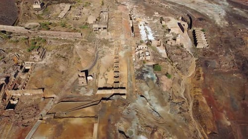Aerial drone view of Mining activity. Apocalypse scenery. Earth destruction. Disruption of nature.
