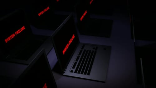 System Failure Warning Message on Laptops with Glitch Effect