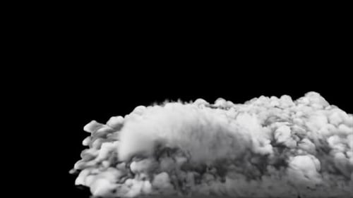De la mousse blanche ou un nuage de fumée gonflé se répandant