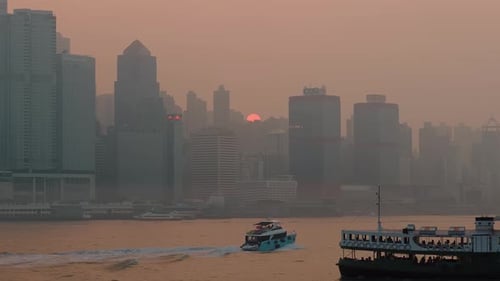 Hong Kong island at sunset. View taken from Kowloon waterfront