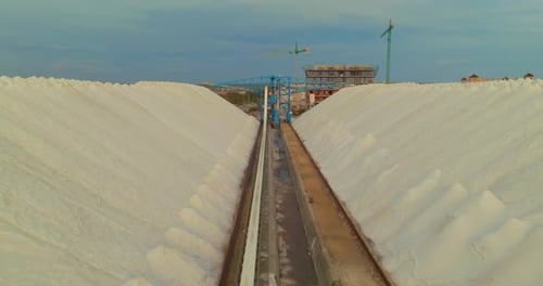 View of a Salt Flat Factory Besides the Sea Raw Materials in Large Volumes are Ready for Export