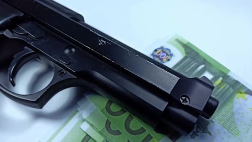 Man Takes Euro Money And Gun