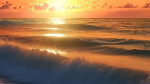 Golden sunset over ocean waves. Waves crash against shore at vibrant sunset