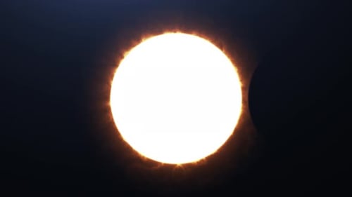 Cinematic Sun Eclipse from Space with stars in the background.