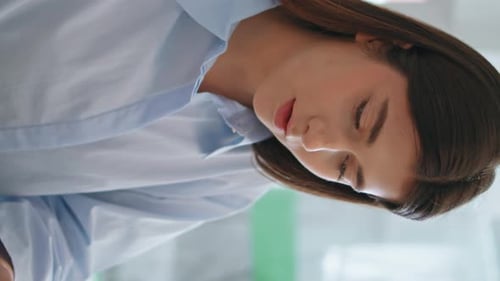 Insurance Manager Consulting Client on Contract Closeup Office Mentor Vertical