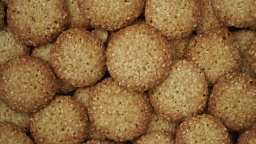 Top View of Sweet Cookies with Sesame Rotate on Tray