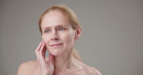 Elegant Woman Touching Face, Smiling