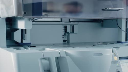 Close-up Shot of Automated Medical Equipmemt Working. Test Tube, Blood and Genetic Material Analyzi