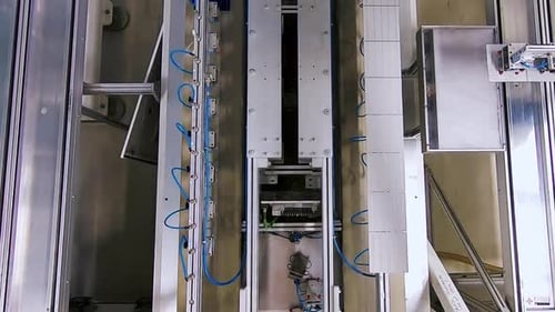 Automated Robotic Arm Moving in Industrial Setting