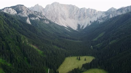 Aerial View of Valley with Mountain Peaks