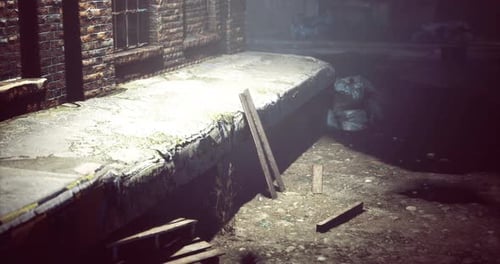 Abandoned Alley with Debris and Dim Lighting in an Urban Setting