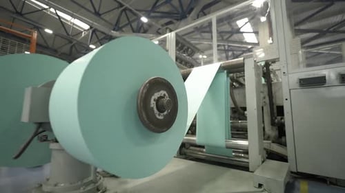 Huge Cylindrical Mechanisms Create Roll Shape of Cardboard