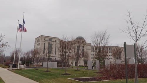 Building Complex with Flags and Memorial Monuments