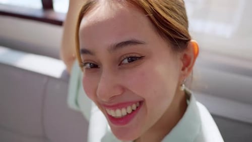 Attractive Woman Smiling Directly at the Camera