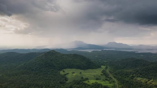 Rainstorms and black clouds are moving over the mountains in the north of Thailand,