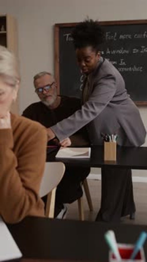 Adults in Class Learning Internet Skills Together