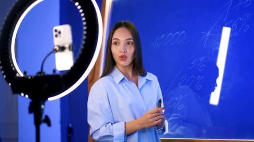 Young Woman Giving Business Presentation with Ring Light