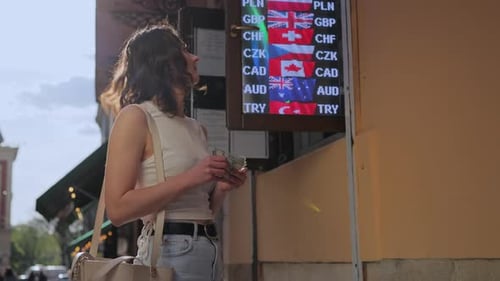 Somme des dollars, conversion en espèces et devises