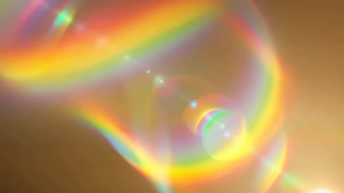 Golden Rainbow Lens Flare with Shimmering Particles