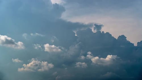 Clouds Billowing in the Blue Daytime Sky