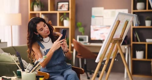 Painter, phone and photography of art in studio for online portfolio, small business