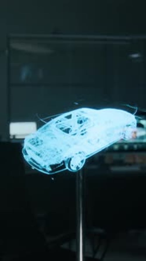 Prototype de voiture laser tridimensionnel projeté dans l'air dans un bureau d'études