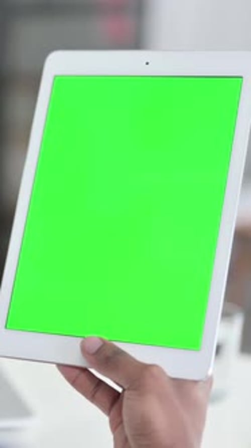 Businessman using Tablet with Green Chroma Key Screen, Vertical Video